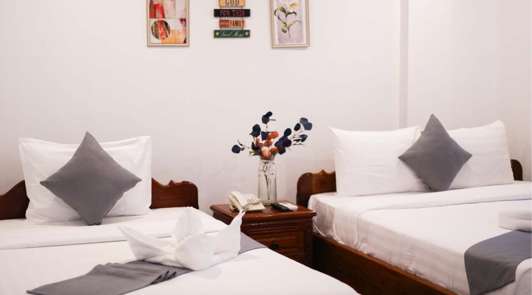 A twin room in a hotel in Cambodia