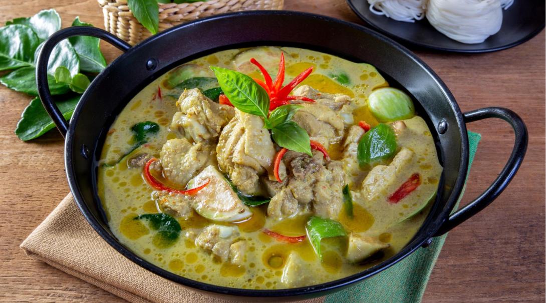 A closeup shot of a traditional Thai green curry
