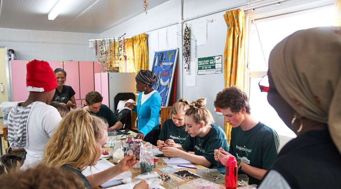 Projects Abroad interns gain International Development work experience assisting local business women.