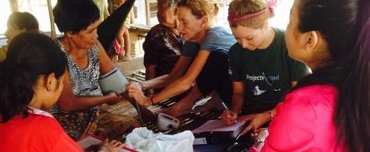 Interns learn how to take people’s blood pressure readings as part of Public Health work for teenagers in Cambodia. 