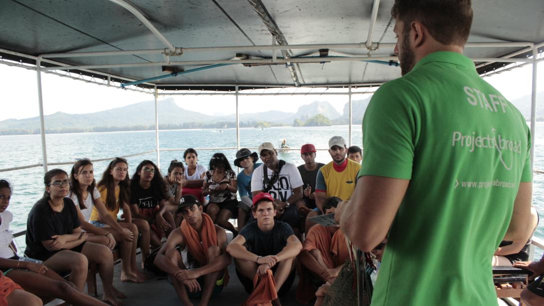Projects Abroad staff member runs volunteers through safety procedures in Thailand.