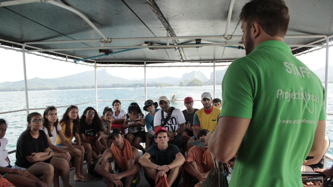 Projects Abroad staff member runs volunteers through safety procedures in Thailand.