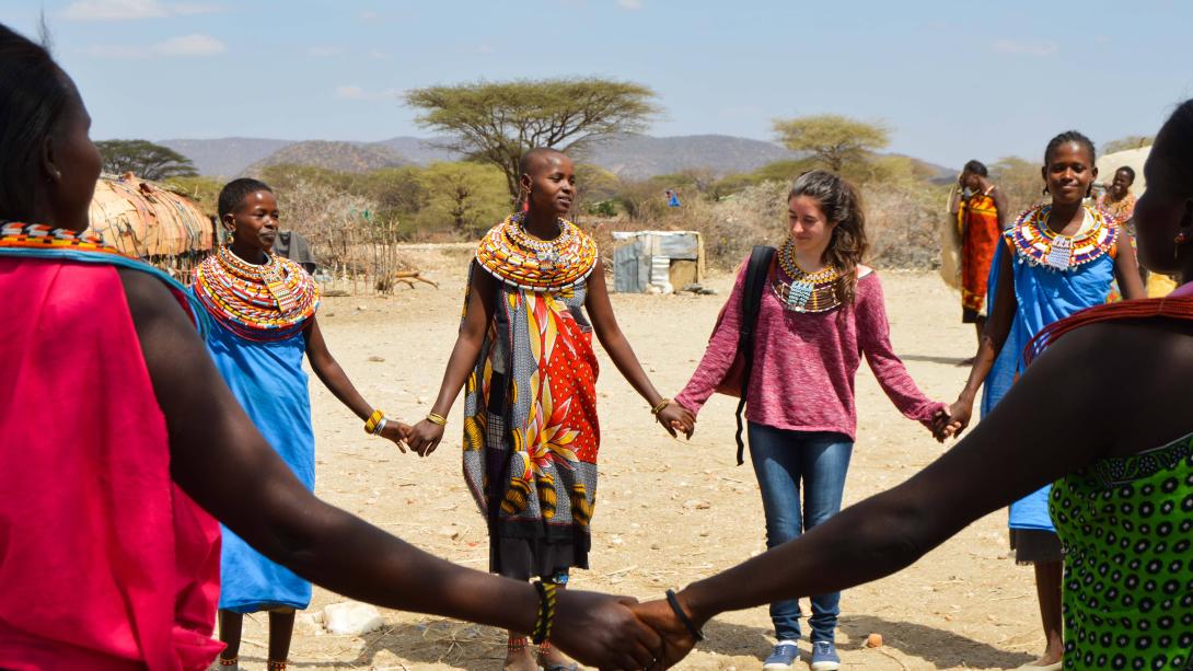 Projects Abroad volunteers learn a traditional dance during their project in Tanzania.