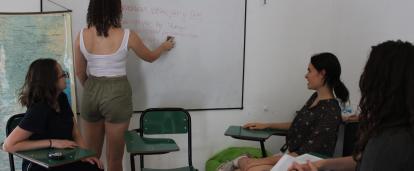 A small group of volunteers in Argentina learn and practice Spanish together.